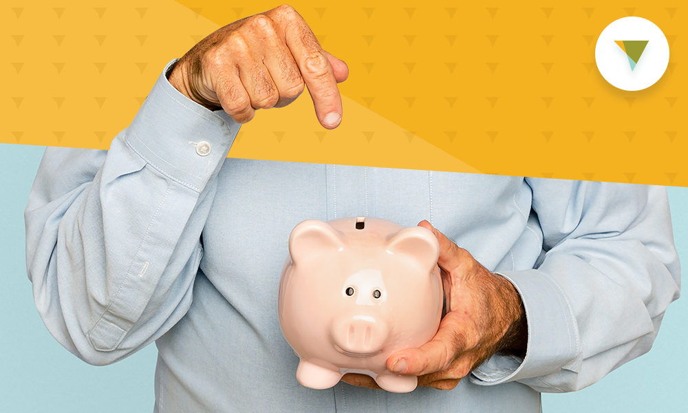 Man holding piggy bank