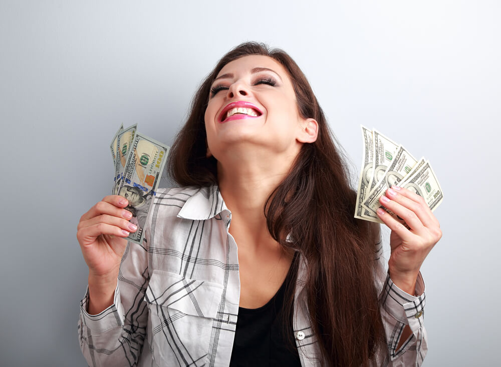 Woman happy about the title loan cash