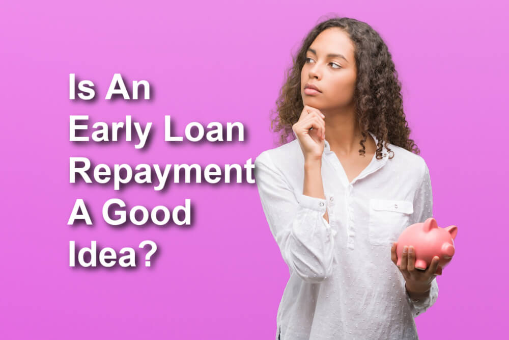 woman holding piggy bank thinking is an early loan repayment a good idea