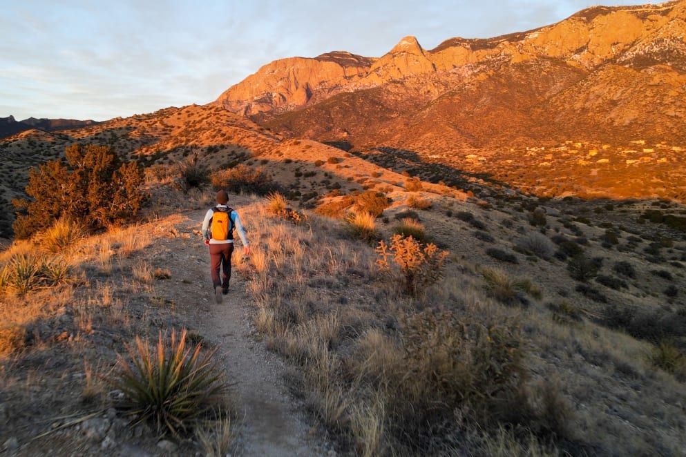 man hiking in albuquerque, new mexico