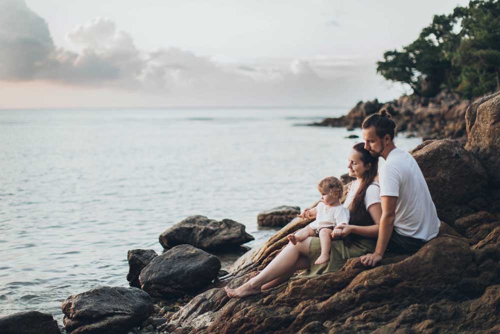 Family on beach.