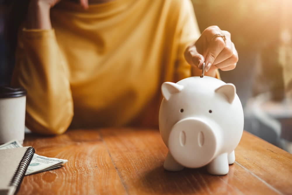 payday loan helped person save money in piggy bank