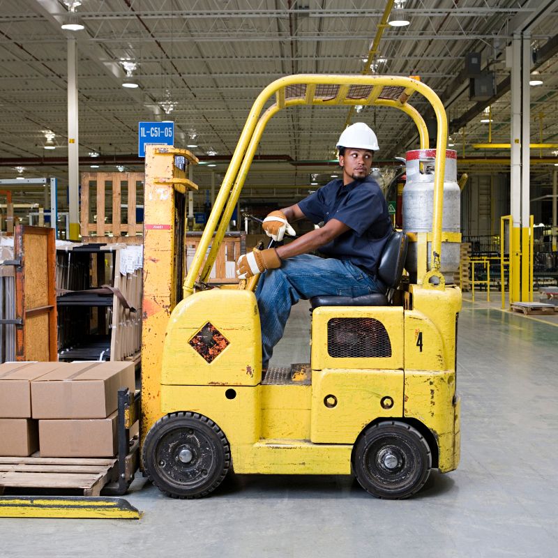 Forklift driver going in reverse