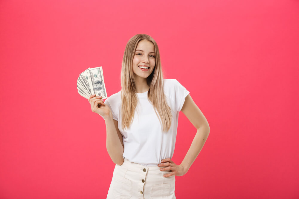 Woman smiling at flex loan cash