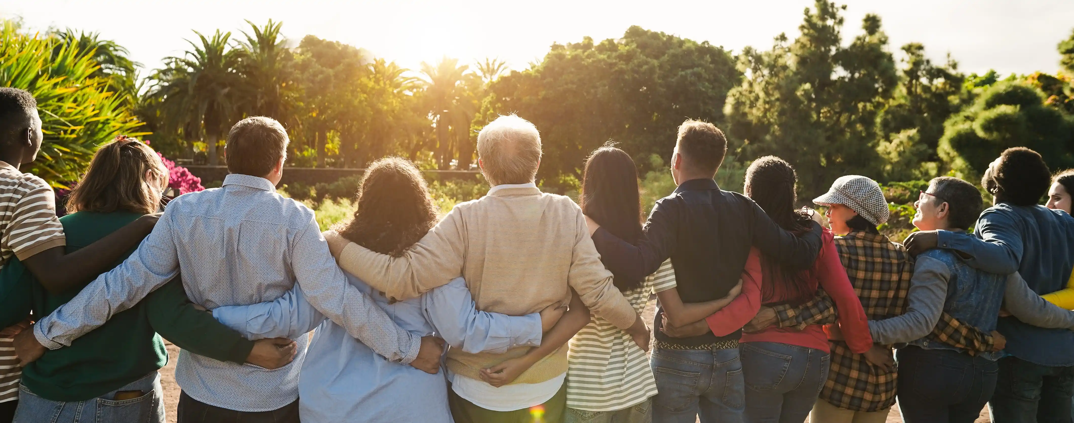 Diverse multigenerational group embracing representing inclusive global workforce