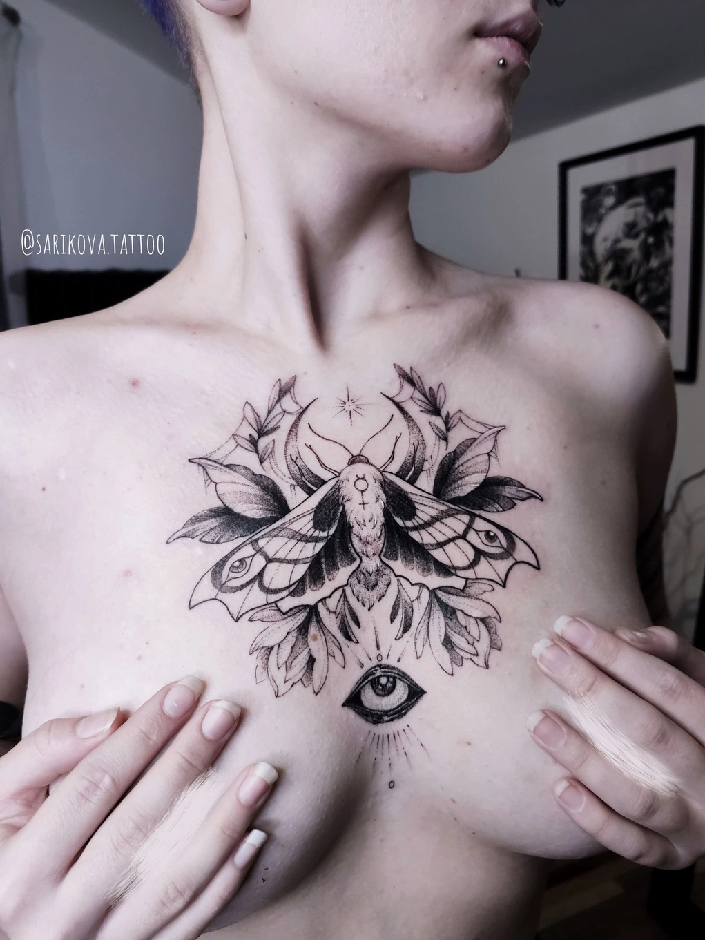 mystical mercury bee symbol tattoo on the chest 