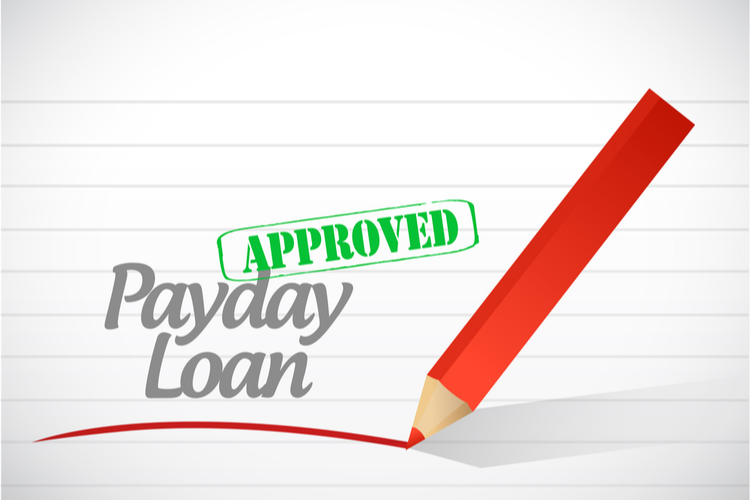 payday loan approval stamped on paper