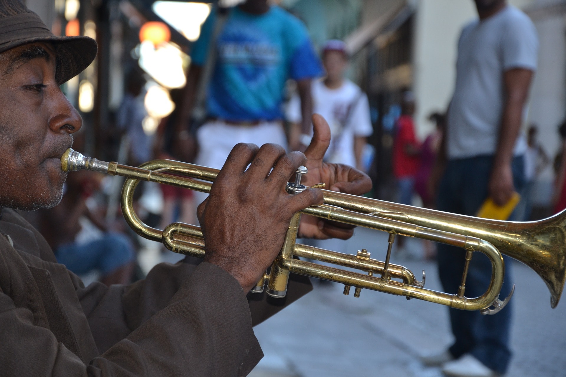 local man playing instrument in cuba
