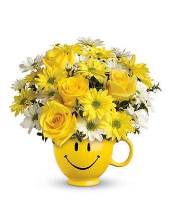 Yellow and White Flowers in Smiley Face Mug