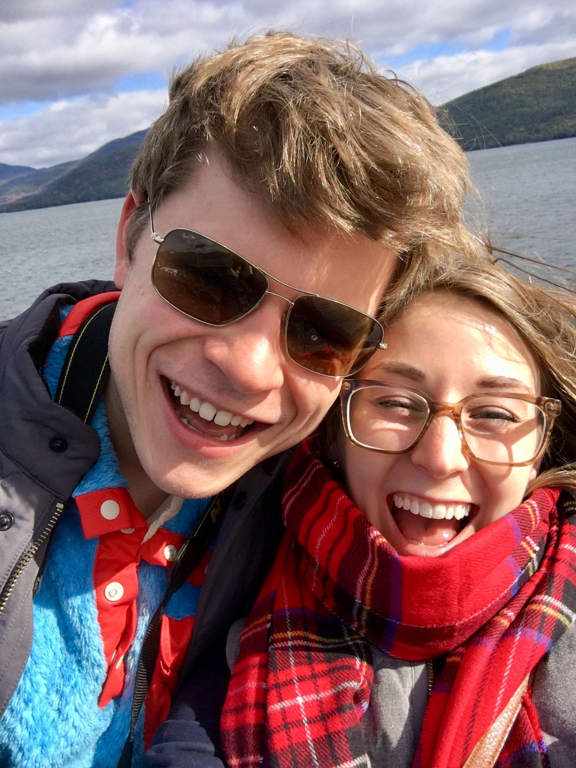 selfie photo of couple on lake