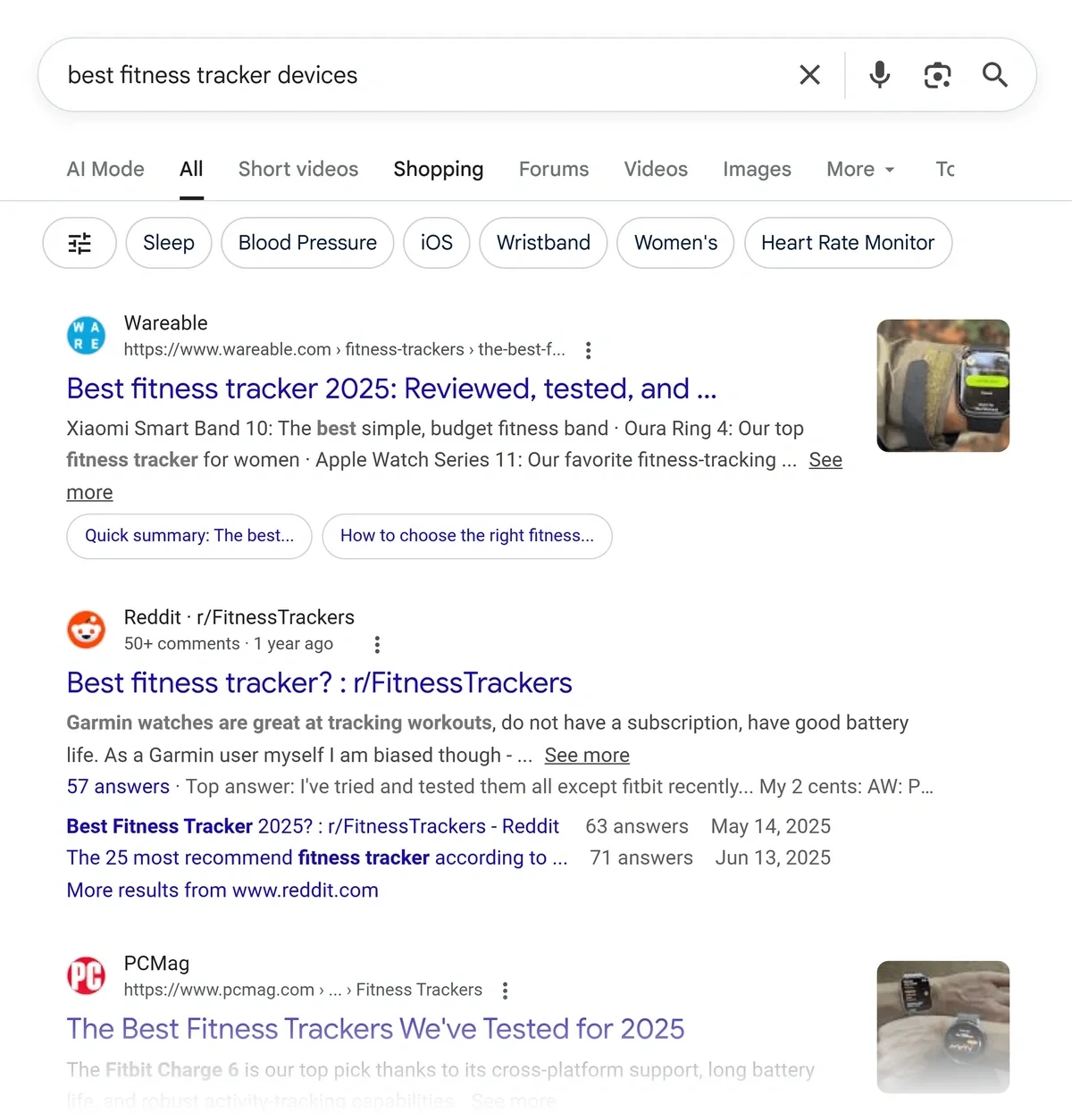 Google search results page for best fitness tracker with multiple Reddit threads ranking