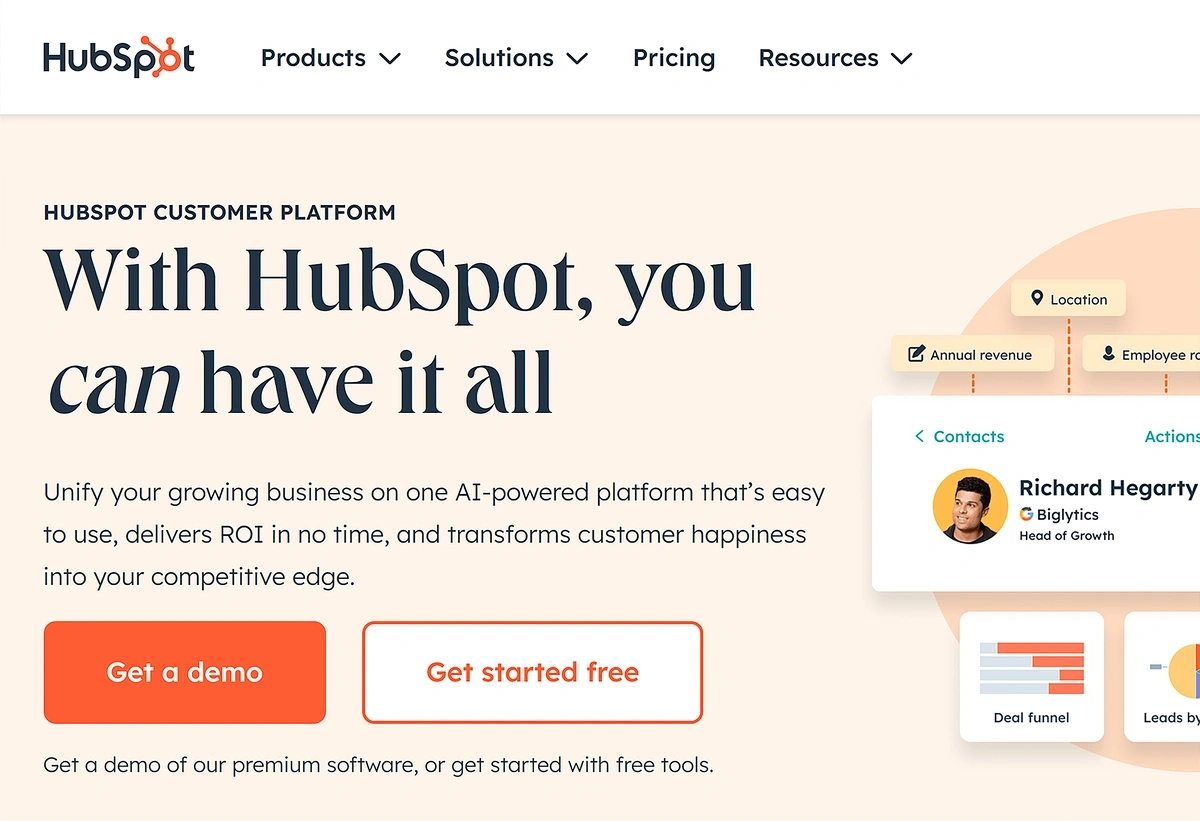 The orange and white HubSpot homepage advertises that its users can have it all