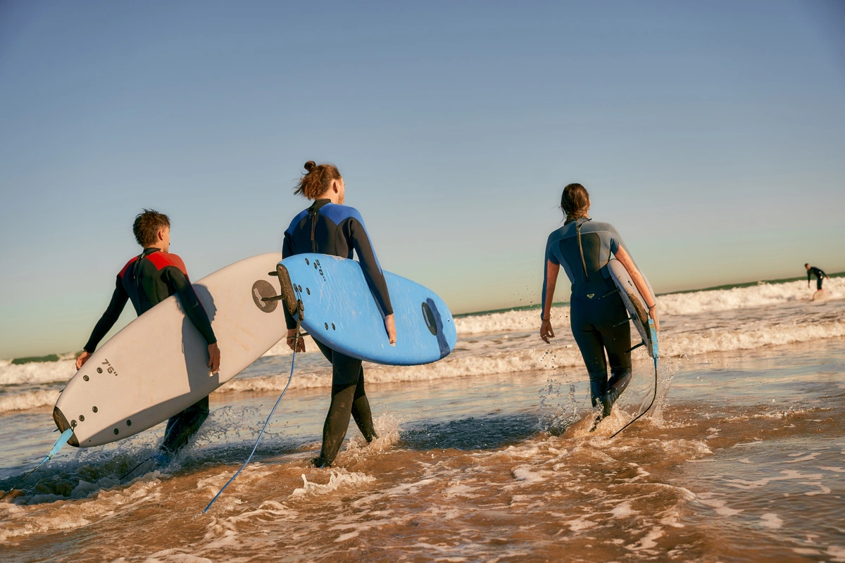 Carrying surfboards to the ocean