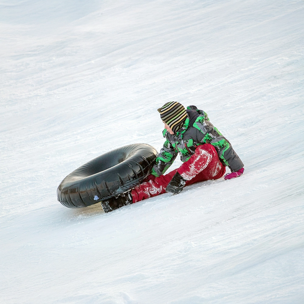 KidSnowTubing.webp