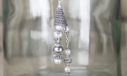 Heishe Spacer Beads with Pearl Drops and Round Metal Beads. Tassel by Gwen Youngblood