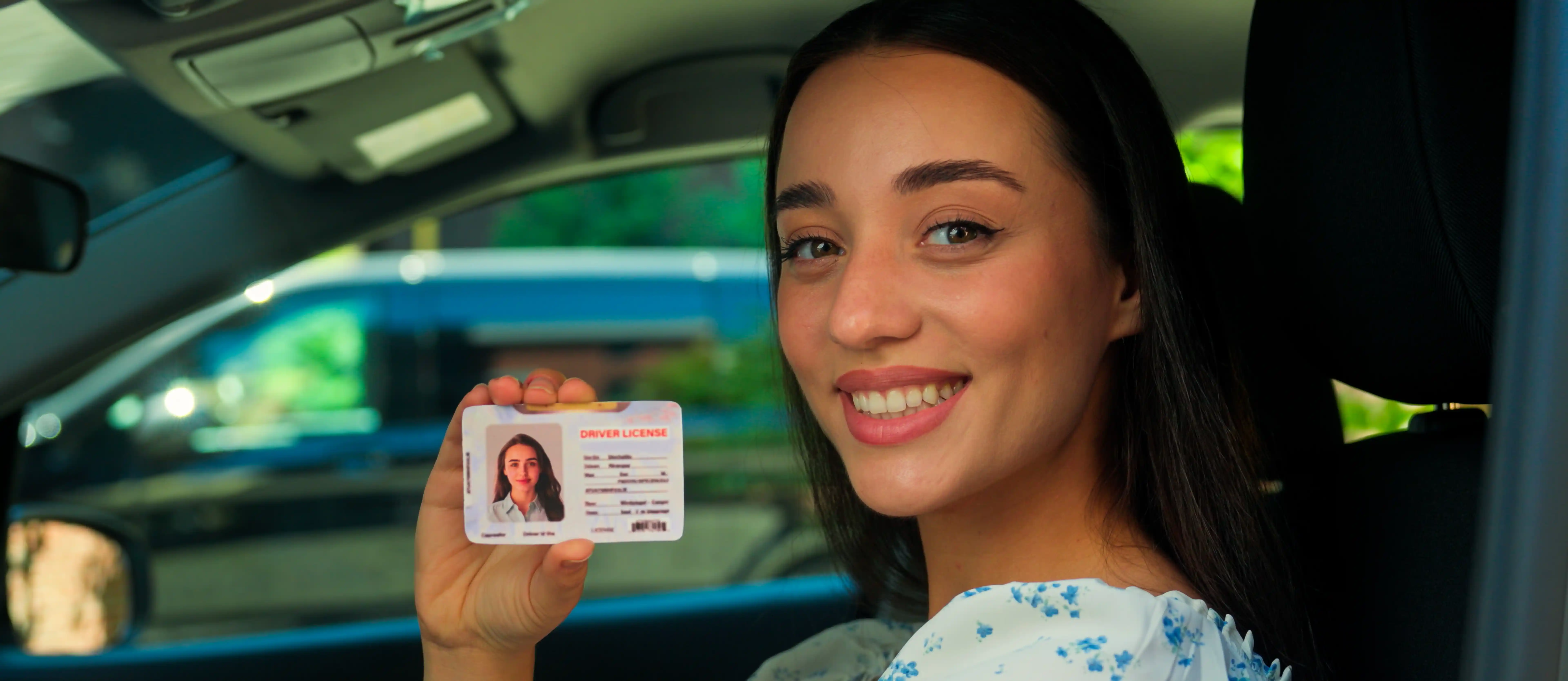 happy smiling female showing id