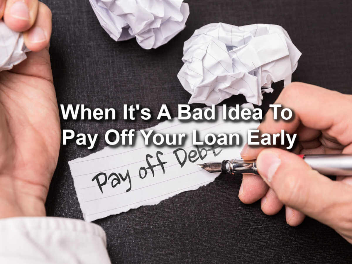 text that says When it's a bad idea to pay off your loan early with person writing pay off debt