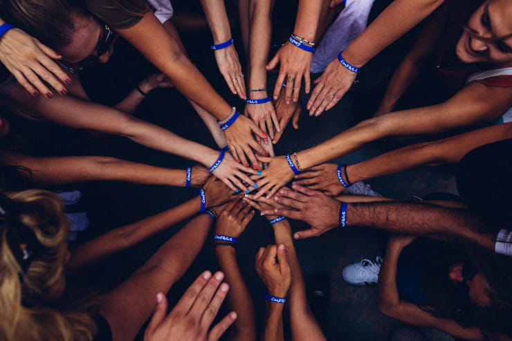 nonprofit team with hands together