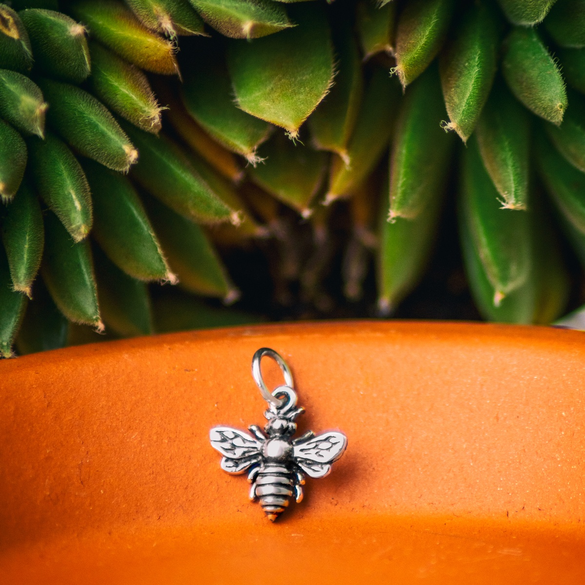 Image with full edits of a bee charm