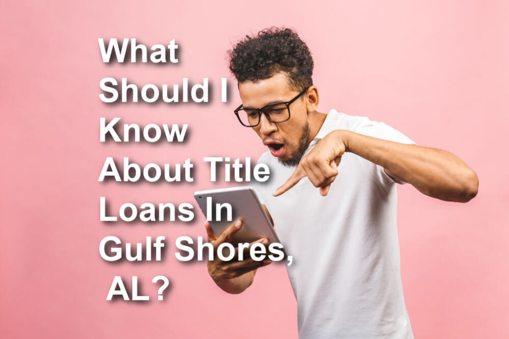 man applying for title pawn online with overlay text What should I know about title loans in Gulf Shores, AL