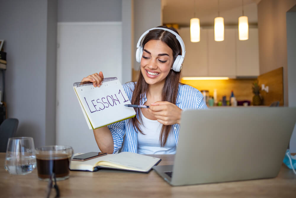 woman tutoring online for a side hustle