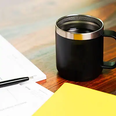 Coffee mug and notes