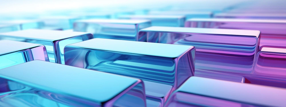A close-up image of a 3D rendering of reflective, glass-like blocks in blue and pink hues, possibly representing digital data storage or blockchain technology.