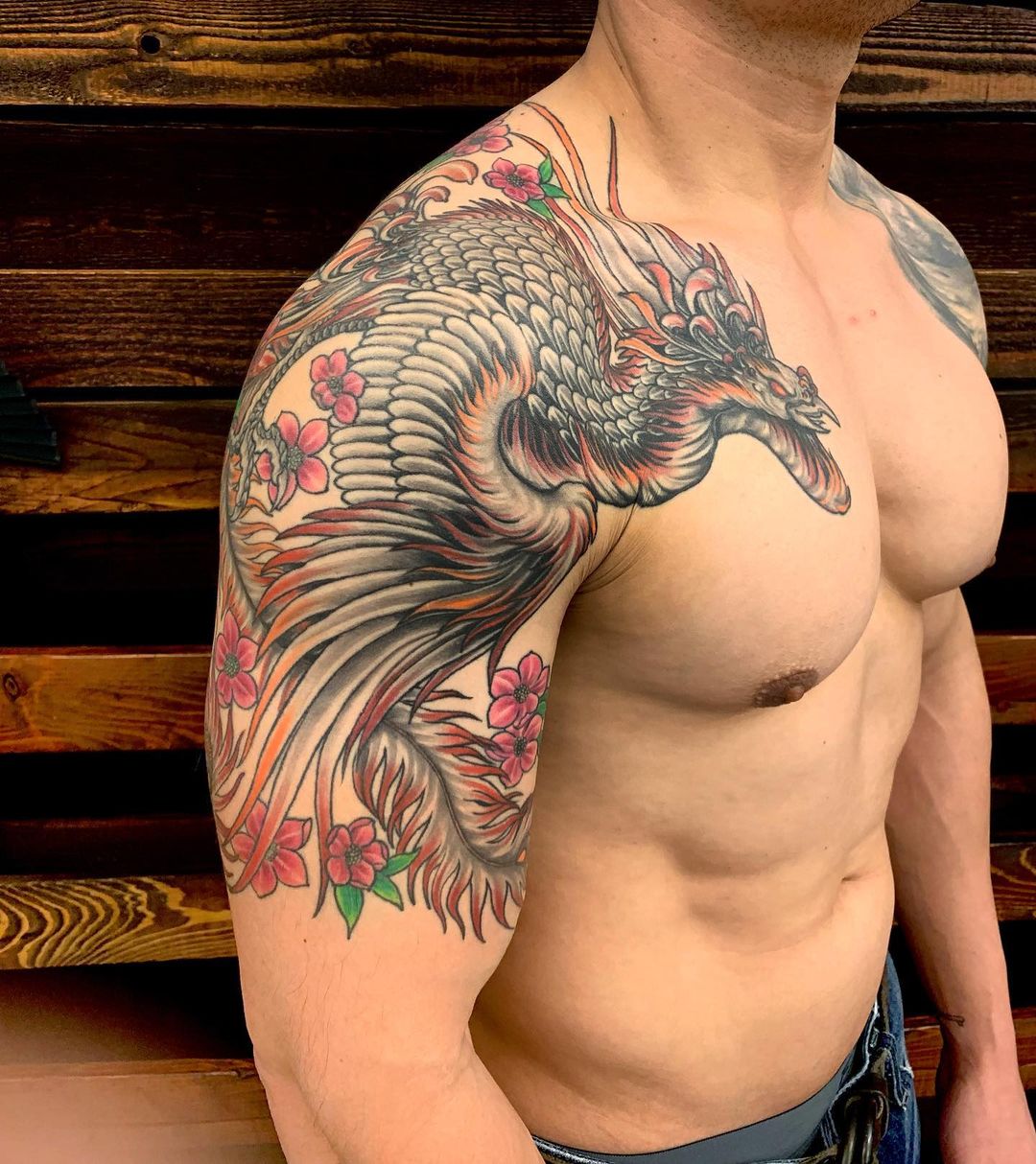 japanese upper arm half sleeve tattoo by tan ngo