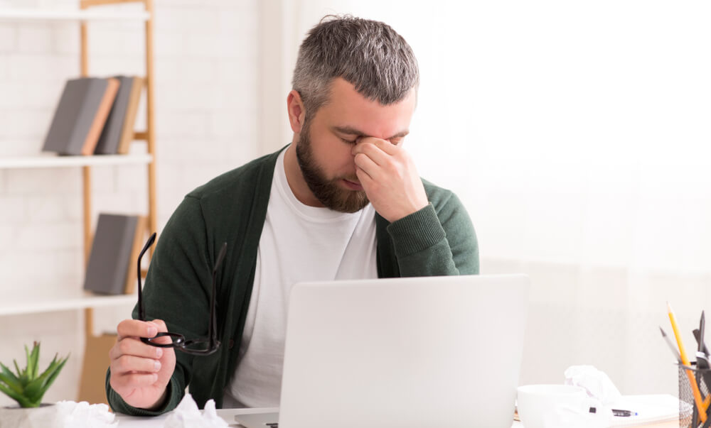 man stressed over due bills needs a cash title loan
