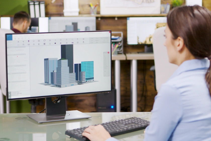 Woman working on CAD on computer