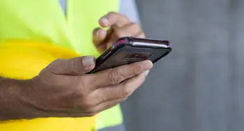 construction worker holding a phone with a good case