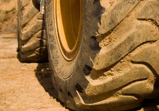 bulldozer tires in dirt