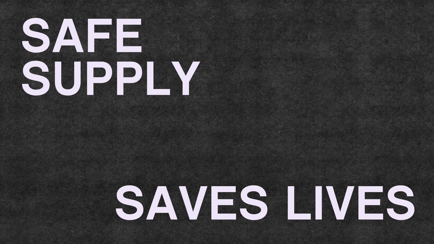 A banner that reads "SAFE SUPPLY SAVES LIVES" in white font on a black background.