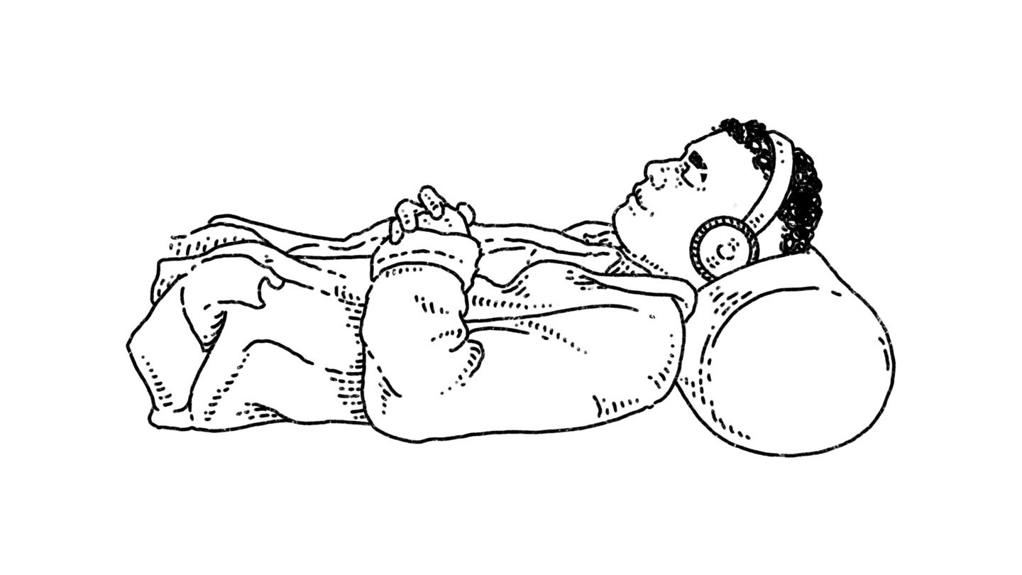 A person relaxing with headphones on.