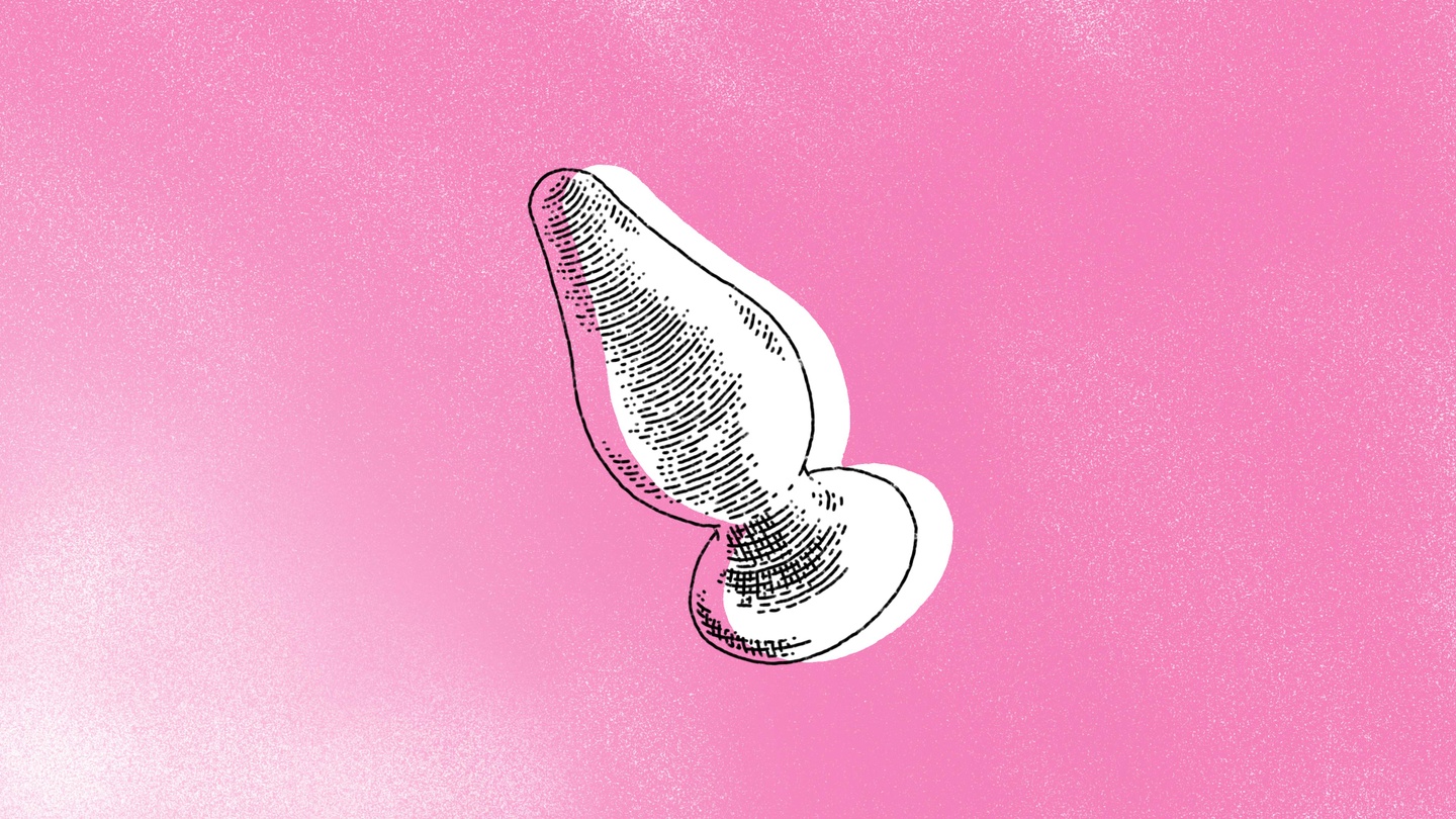 Butt plug sex toy on a pink background