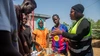 One of Vasco Hamisi's staff members teaching a group of young people how to wire and connect solar panels, Kakuma refugee camp, 2025.