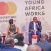 His Excellency the President, Hon. Uhuru Kenyatta and Reeta Roy, CEO, Mastercard Foundation sitting on stage