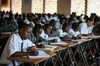 A group of students working at their desks.