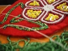 A close-up of a hand-beaded flower.