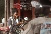 A young woman working in a mechanic shop, URDT Institute, Uganda, 2024