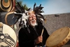 Man beating a drum