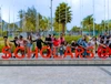 Group of people attending and celebrating behind a large sign reading 'Scholars @ 10' at the Baobab Summit 2022