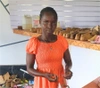 Cecilia Lemon mending sandals in a workshop