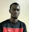 Ousmane Ndieguene in a black and red shirt