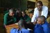   Anselm Ntakirutimana teaching students