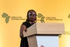 Wambui Chege at AFSF 2025 delivering the opening remarks at the podium at the youth dome.