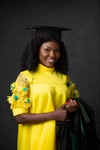 Women in Yellow dress smiling at camera