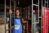 A young worker in a store in Kampala, Uganda