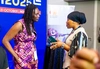 Two women speaking at the ADEA Triennale 2025 in Ghana