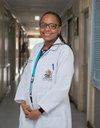 Dr. Maryanne Wanjiru standing in the KAVI Institute of Clinical Research, University of Nairobi.